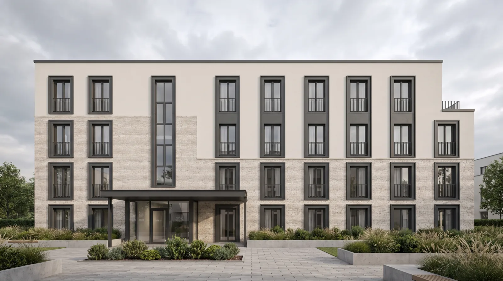 Boardinghouse mit gleichmäßigem Fensterraster, hellem Klinker und überdachtem Eingang